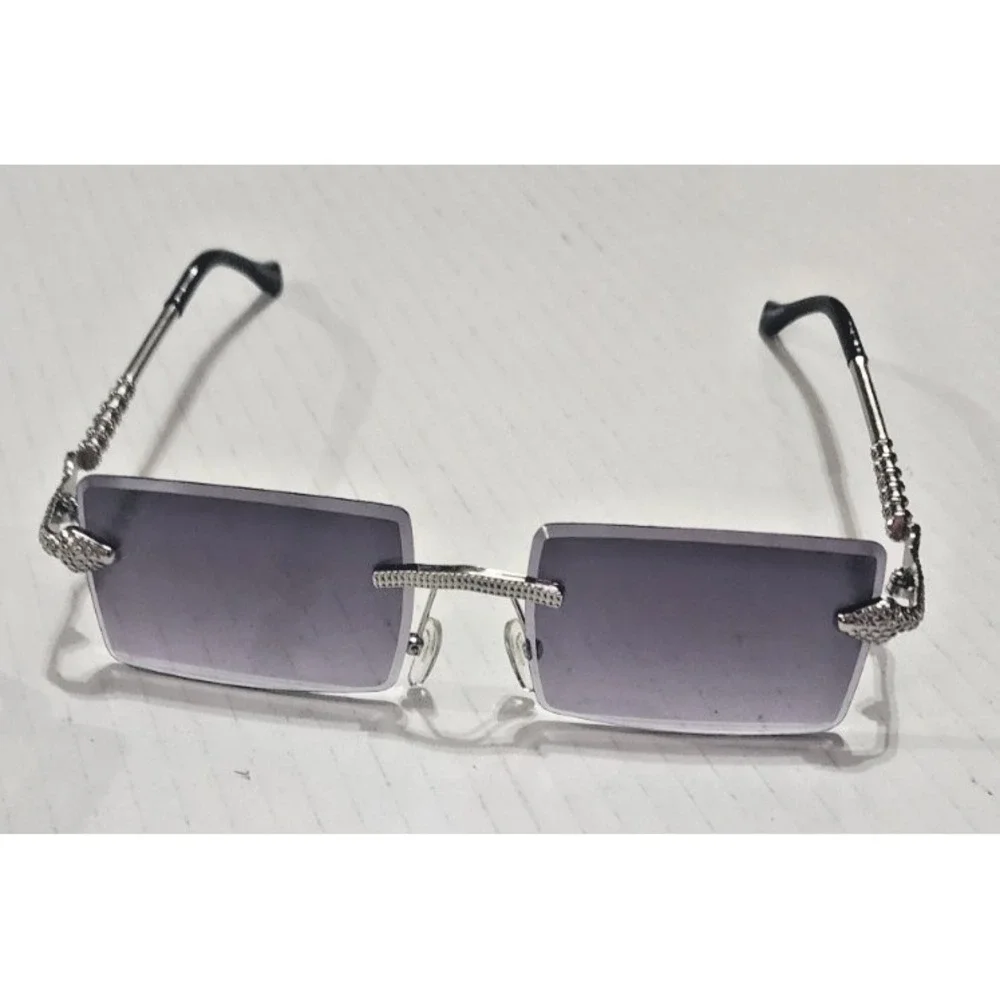 Womens silver snake embellished rimless fashionable sunglasses uv protection